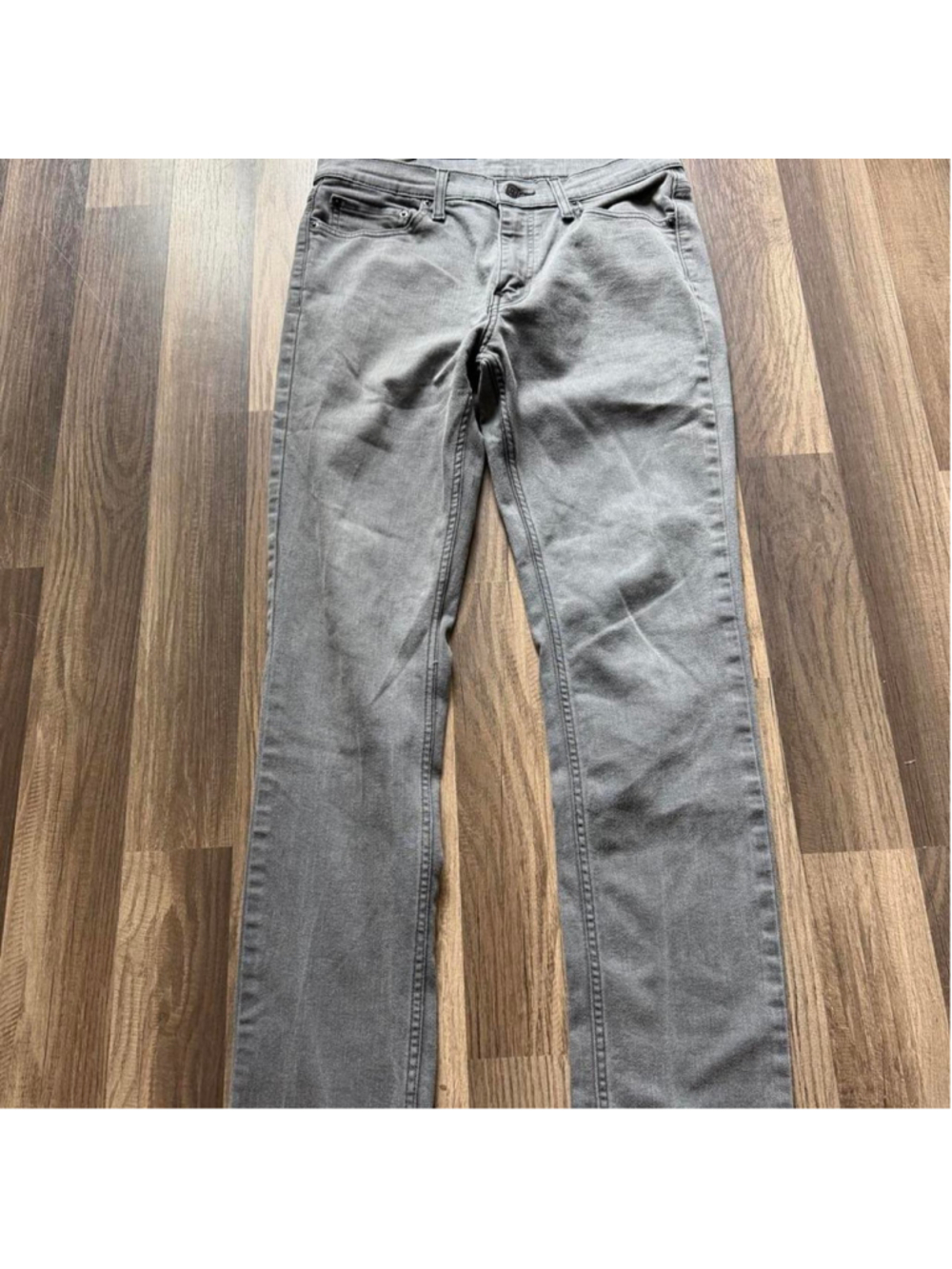 Levi’s 511 slim jeans in a faded washed gray / charcoal denim